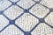 Blue grey vintage mosaic tiles pavement, Lisbon