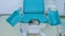 Blue gynecological chair in medical office in clinic.