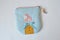 Blue handmade zipper pouch with cute doll