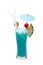 Blue Hawaii cocktail Tall glass with umbrella with pineapple and red cherries.Suitable for drinking for refreshing, quenching