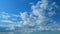 Blue Heaven Summer Cloudscape. Rolling Puffy White Layered Clouds Are Moving. Tropical Summer Sunlight. Tropical Sky At