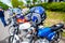 Blue helmet hangs on motorbike