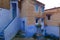 Blue historical streets of Morocco. Tiled sheds on the windows are very nice