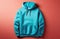 blue hoodie sweatshirt on red background, flatlay, top view. young people streetwear style