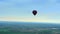 Blue horizon aerial view shot. Air balloon, landscape, pilot pov