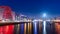 Blue hour at Dublin docks. Beautifully illuminated embankment and harbour