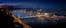 Blue hour shot. Panoramic look down from Gellert hill to castle hill, Danube river with parliament building, Elisabeth Bridge and