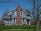 Blue House with Shake Siding and Fireplace Chimney