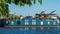 Blue houseboat rests in Treptow in the river Spree. Berlin. Germany