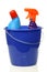 Blue household bucket with cleaning bottles