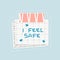 Blue I feel Safe text on squared paper with dots. A piece of newspaper is at the bottom, pink stationery tape with lines on the