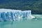 Blue ice of calving Perito Moreno Glacier in Glaciers national park in Patagonia