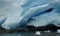 Blue ice of Nigardsbreen glacier arm in Autumn in Norway