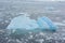 Blue iceberg in field of floes, Antarctica