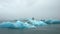 Blue Iceberg in Foggy Glacier Lagoon. Beautiful Natural Miracle in North Country, Iceland. Blue Ice Melting Due To