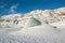 Blue iceberg on a frozen glacial lake at Skaftafellsjokull glacier at winter, Iceland