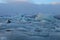 Blue icebergs floating in the jokulsarlon lagoon in Iceland.