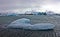 Blue Icebergs of Jokulsarlon with Snaefell Mountain, Iceland