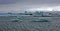 Blue Icebergs of Jokulsarlon with Snaefell Mountain, Iceland