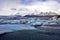 Blue Icebergs of Jokulsarlon with Snaefell Mountain, Iceland