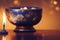 Blue incense cup had a golden pattern, the candlelight, warm light with Generative AI