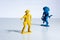 Blue indian and yellow cowboy plastic toy figures