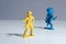 Blue indian and yellow cowboy plastic toy figures