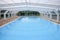 Blue indoor beautiful pool with glasshouse