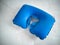 Blue inflatable pillow for comfortable neck position