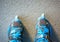 Blue inline roller skates - first person view.