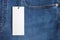 Blue jeans with blank white price label tag