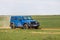 Blue Jeep Wrangler Rubicon Unlimited in steppe near Utta village.