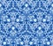 Blue kaleidoscope seamless pattern, background. Composed of abstract shapes.