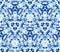 Blue kaleidoscope seamless pattern. Seamless pattern composed of color abstract elements located on white background.