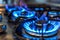 Blue kitchen gas stove flame in kitchen