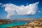 Blue Lagoon, Malta - Beautiful clouds over malta`s famous Blue Lagoon on the island of Comino with the island of Gozo