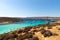 He Blue Lagoon is a popular  small bay for a day trip with shallow, azure-coloured water on the West coast of Comino island