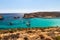 He Blue Lagoon is a popular  small bay for a day trip with shallow, azure-coloured water on the West coast of Comino island