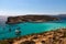 He Blue Lagoon is a popular  small bay for a day trip with shallow, azure-coloured water on the West coast of Comino island