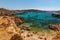 He Blue Lagoon is a popular  small bay for a day trip with shallow, azure-coloured water on the West coast of Comino island