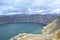 Blue lake in the crater of Quilotoa volcano, Ecuador