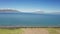 Blue lake and grassland in a sunny day