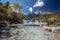 Blue lake in the Himalayas tibet mountains with trees and blue sky in China at autumn