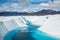 Blue lake on the Matanuska Glacier. Supraglacial lake on top of the white ice. Deep blue color