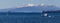 Blue Lake Taupo panorama, boat and volcanoe