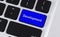 Blue laptop keyboard button with word Development