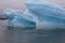 Blue large icebergs in Jokulsarlon glacier lake in Iceland