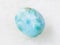 blue Larimar gemstone on white