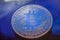 Blue Light On Bitcoin Currency Coin Extreme Close-up
