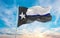 blue line flag of Texas state, Usa at cloudy sky background on sunset, panoramic view. United states of America police flag. copy